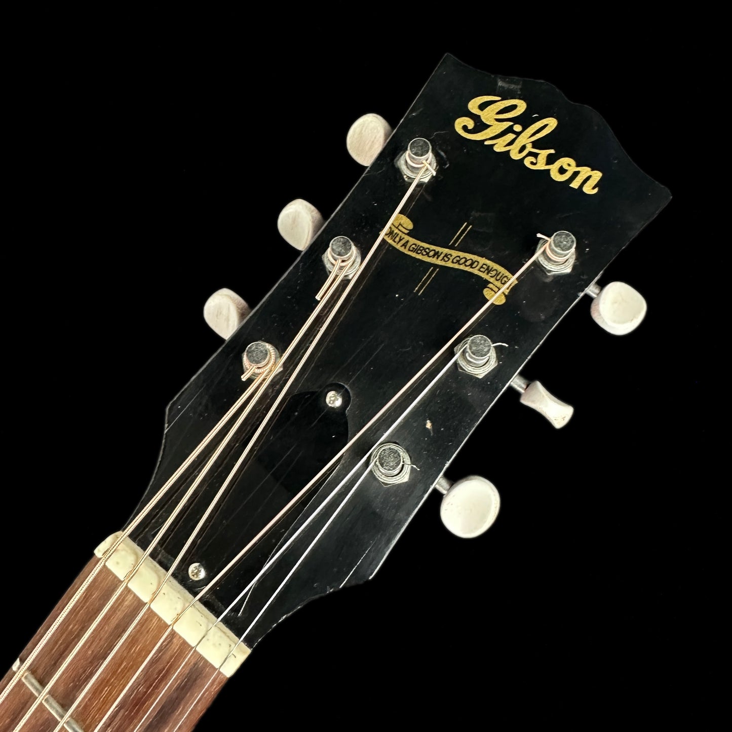 Front of headstock of Used Gibson 1942 LG2 Banner.