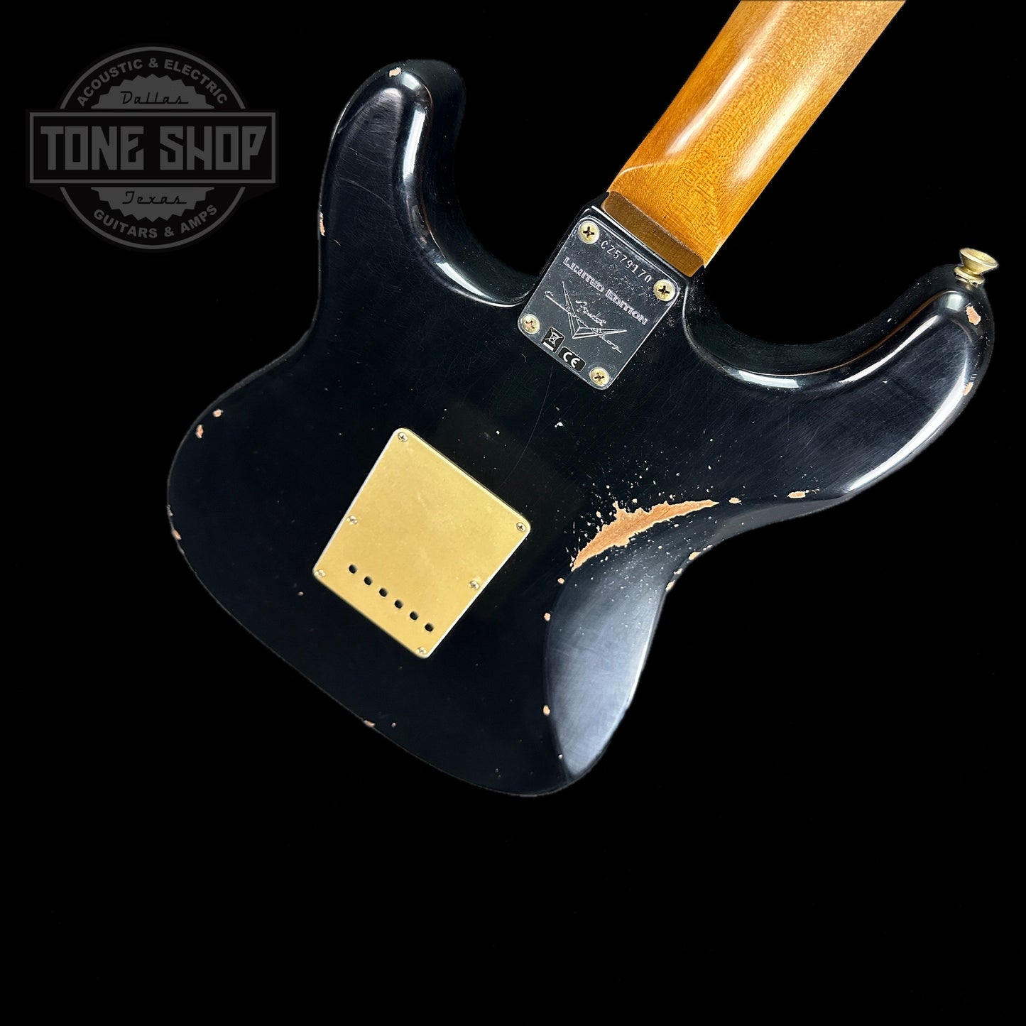 Back angle of Fender Custom Shop 2023 Collection Ltd Roasted Big Head Strat Relic Aged Black.
