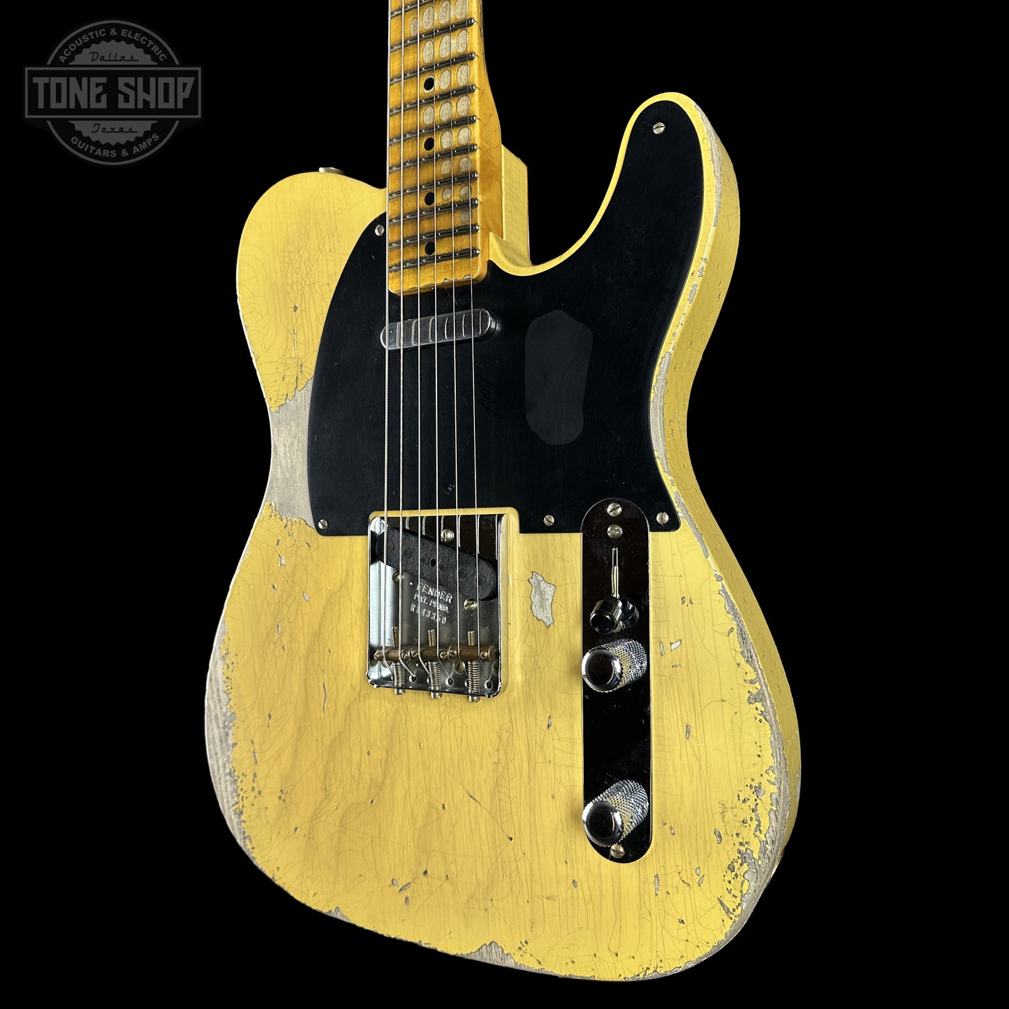 Front right angle of Fender Custom Shop 1951 Nocaster Super Heavy Relic Super Faded Aged Nocaster Blonde.