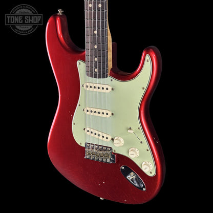 Front right angle of Fender Custom Shop 1963 Stratocaster Journeyman Relic Candy Apple Red AAA Maple Neck body.