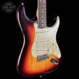 Front left angle of Fender Custom Shop 1963 Stratocaster Journeyman Relic Chocolate 3 Tone Sunburst AAA Maple Neck Fender Custom Shop 1963 Stratocaster Journeyman Relic Chocolate 3 Tone Sunburst AAA Maple Neck CZ588244 body.