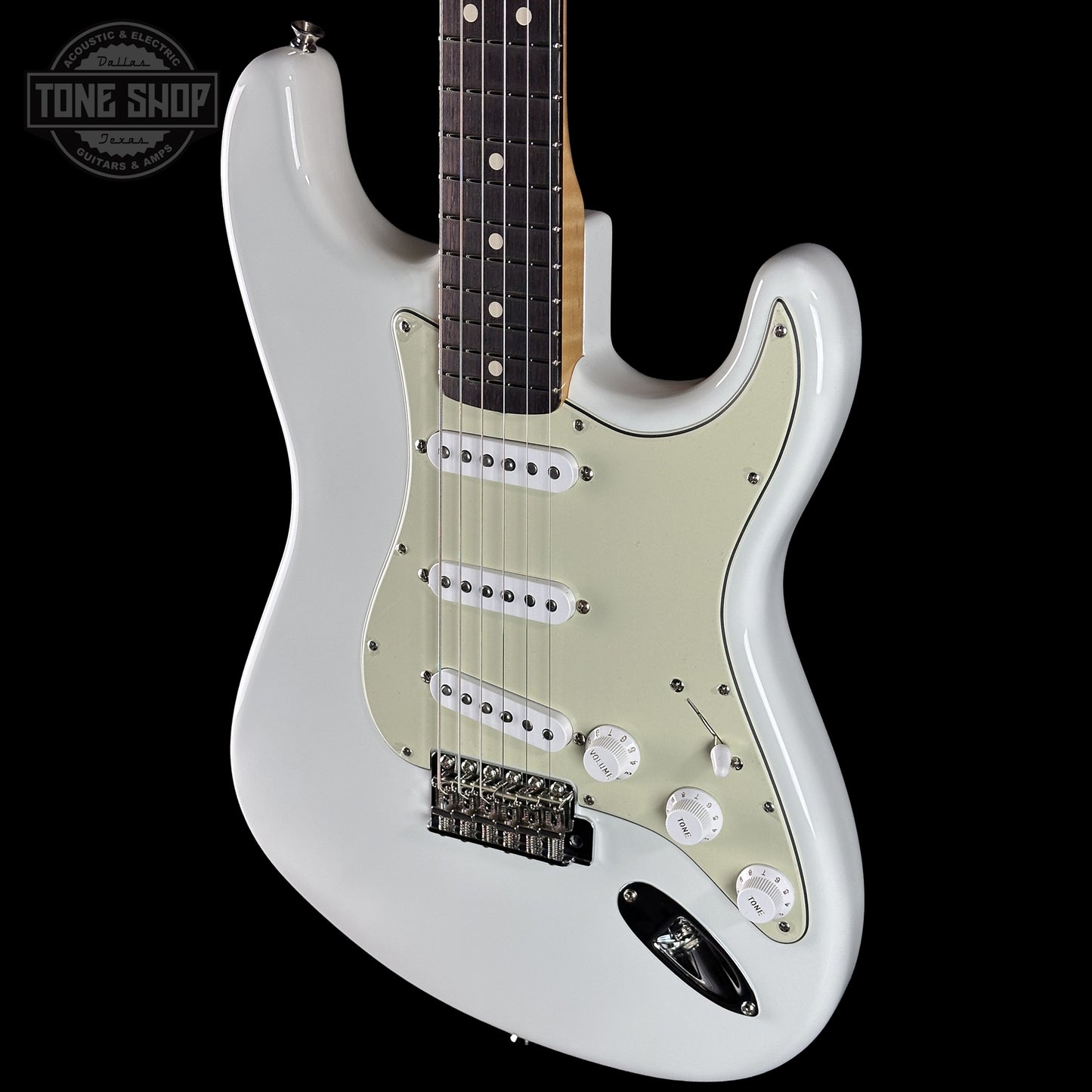 Front right angle of Fender Custom Shop 1963 Stratocaster NOS Olympic White AAA Maple Neck body.