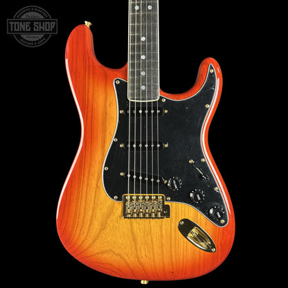 Front of Fender Custom Shop American Custom Stratocaster NOS Ebony Fingerboard Sienna Sunburst.
