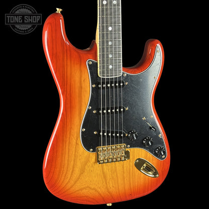 Front left angle of Fender Custom Shop American Custom Stratocaster NOS Ebony Fingerboard Sienna Sunburst.