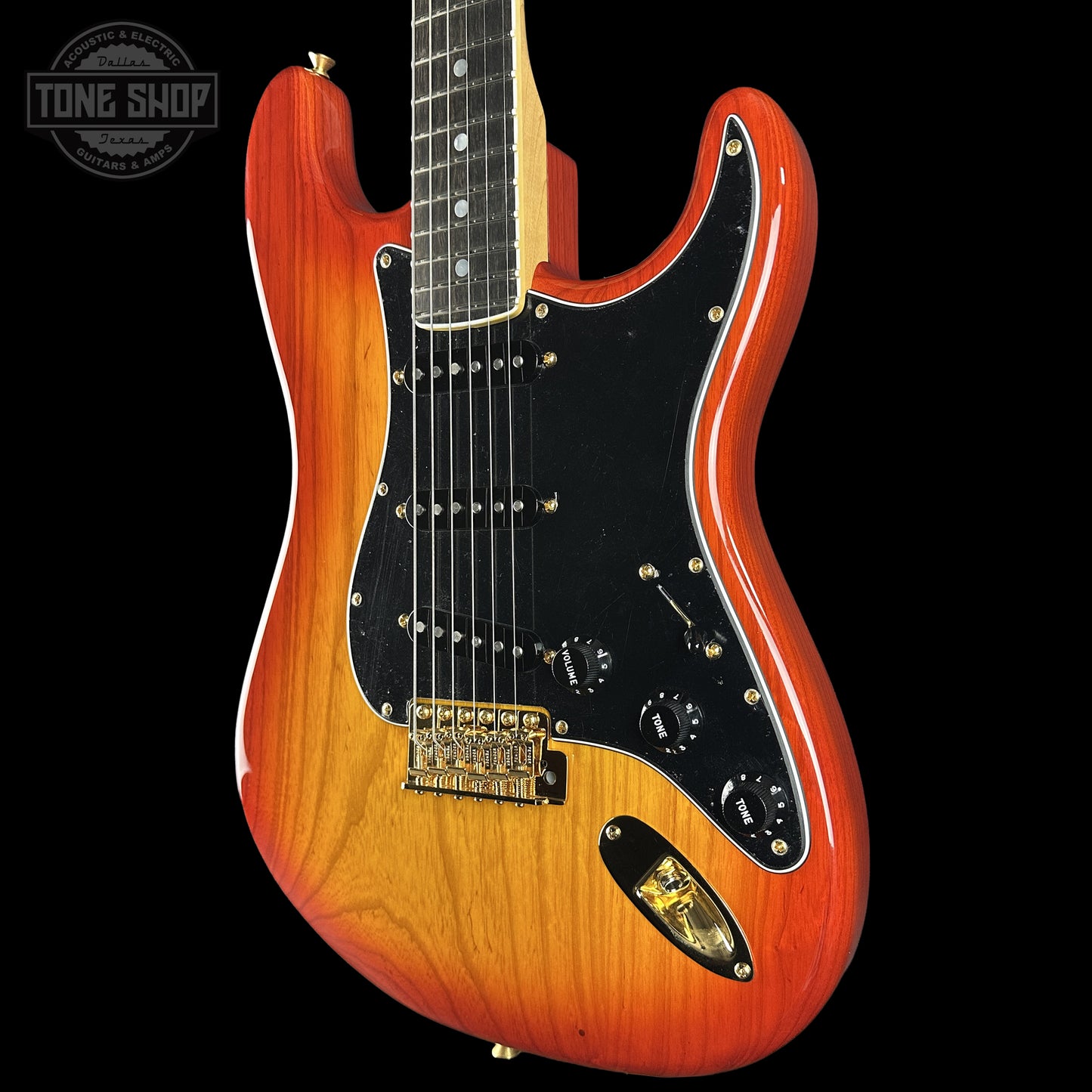 Front right angle of Fender Custom Shop American Custom Stratocaster NOS Ebony Fingerboard Sienna Sunburst.