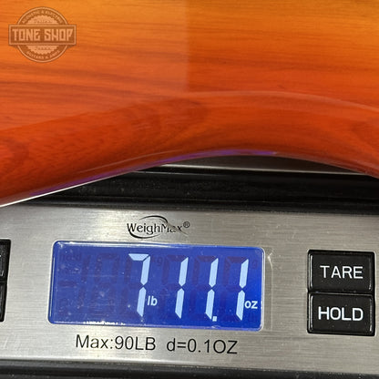 Weight of Fender Custom Shop American Custom Stratocaster NOS Ebony Fingerboard Sienna Sunburst.