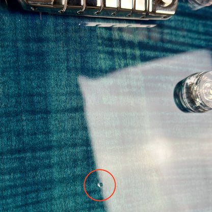 Small ding near controls of Used PRS SE Zach Myers Blue.