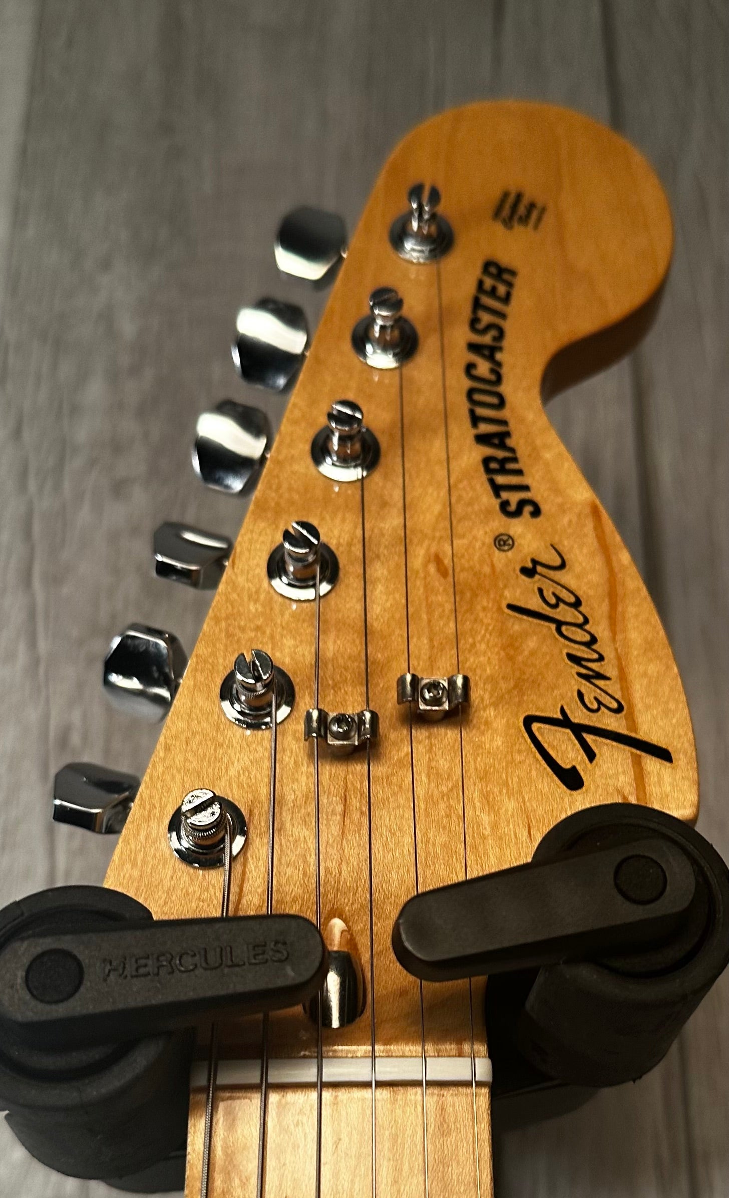 Headstock view of Used 2014 Fender 70s Stratocaster MN 3 Color Sunburst 