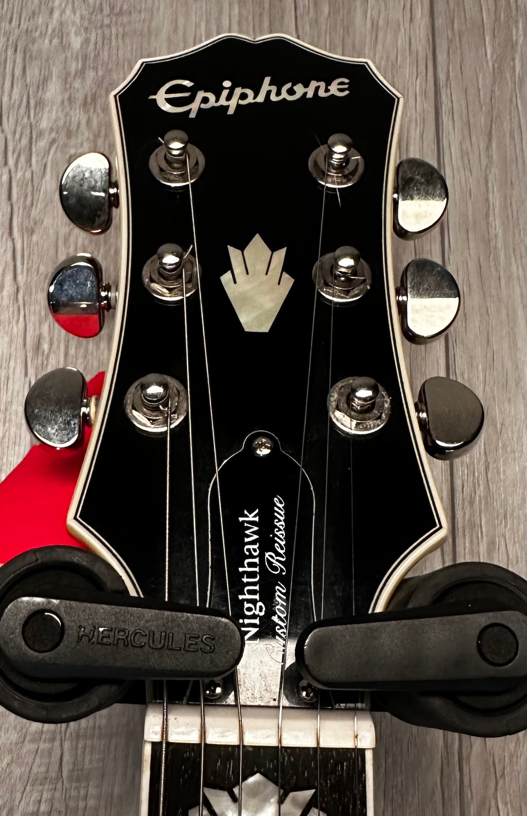 Headstock view of Used 2013 Epiphone Nighthawk Custom Reissue Sunburst 