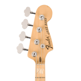 Close-up of a Fender Jazz Bass headstock in natural wood with four silver tuning pegs and black script branding on a white background.