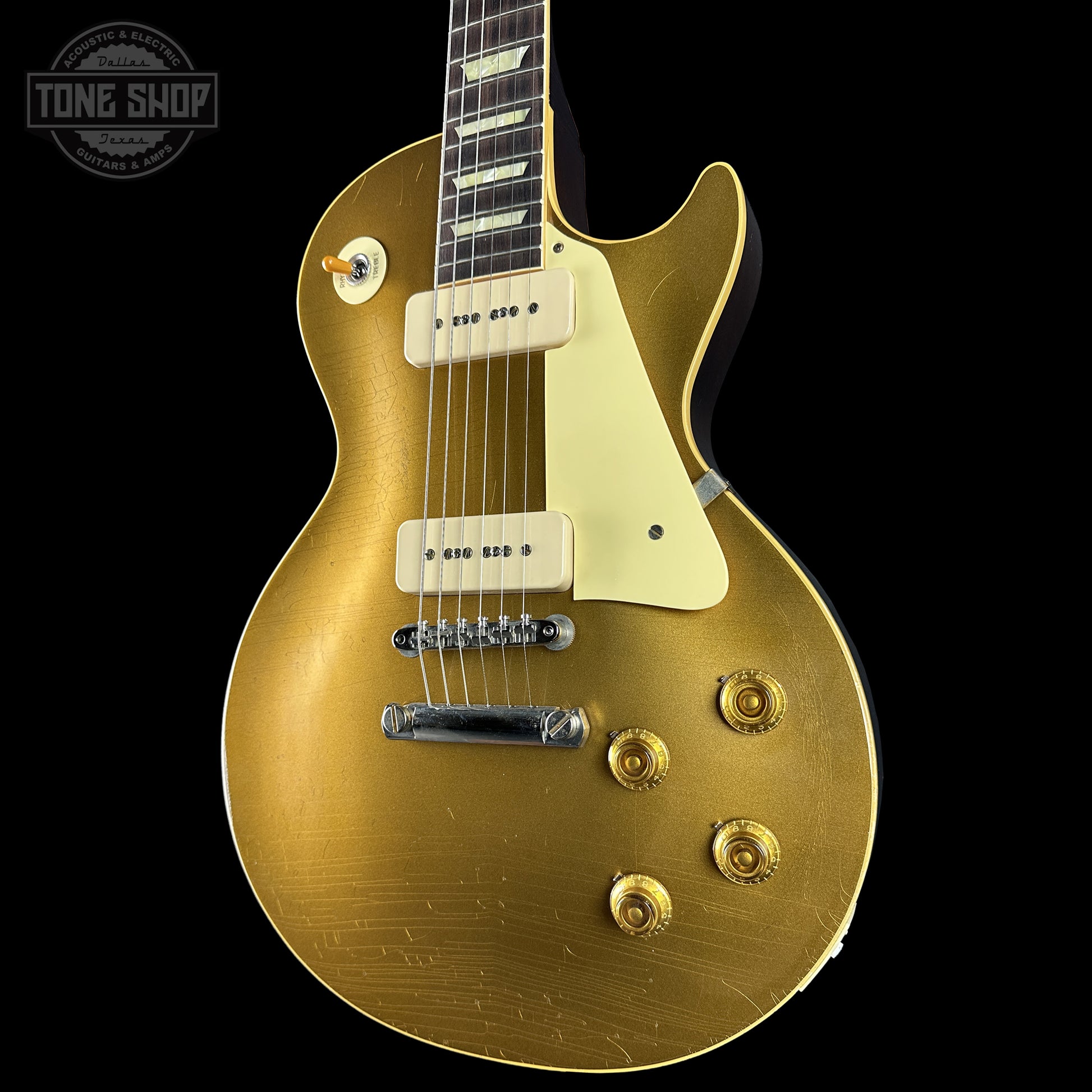 Front right angle of Gibson Custom Dealer Select 1956 Les Paul Chambered Goldtop Aged 64545.