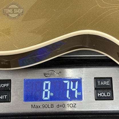 Weight of Gibson Custom Dealer Select 1964 ES-335 Double Gold w/Black Stinger Ultra Light Aged.