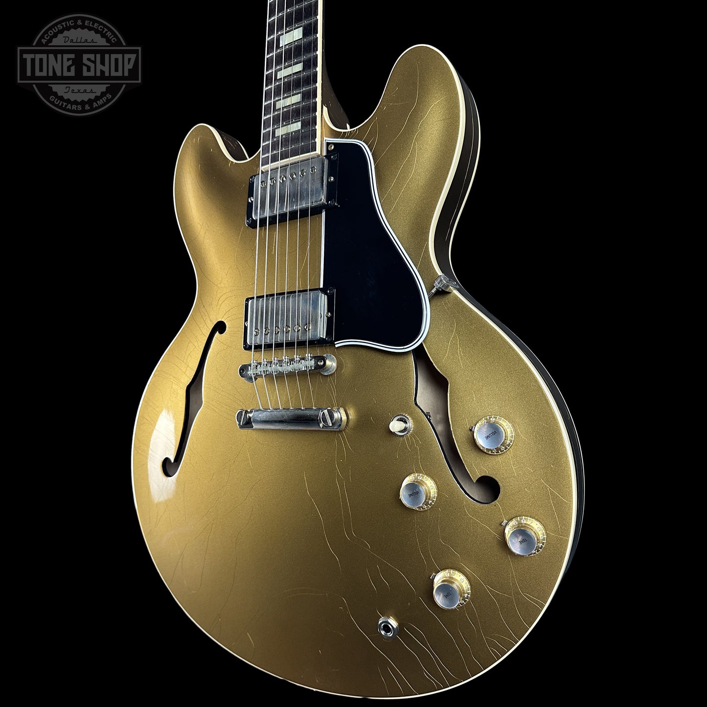Front left angle of Gibson Custom Dealer Select 1964 ES-335 Double Gold w/Black Stinger Ultra Light Aged.