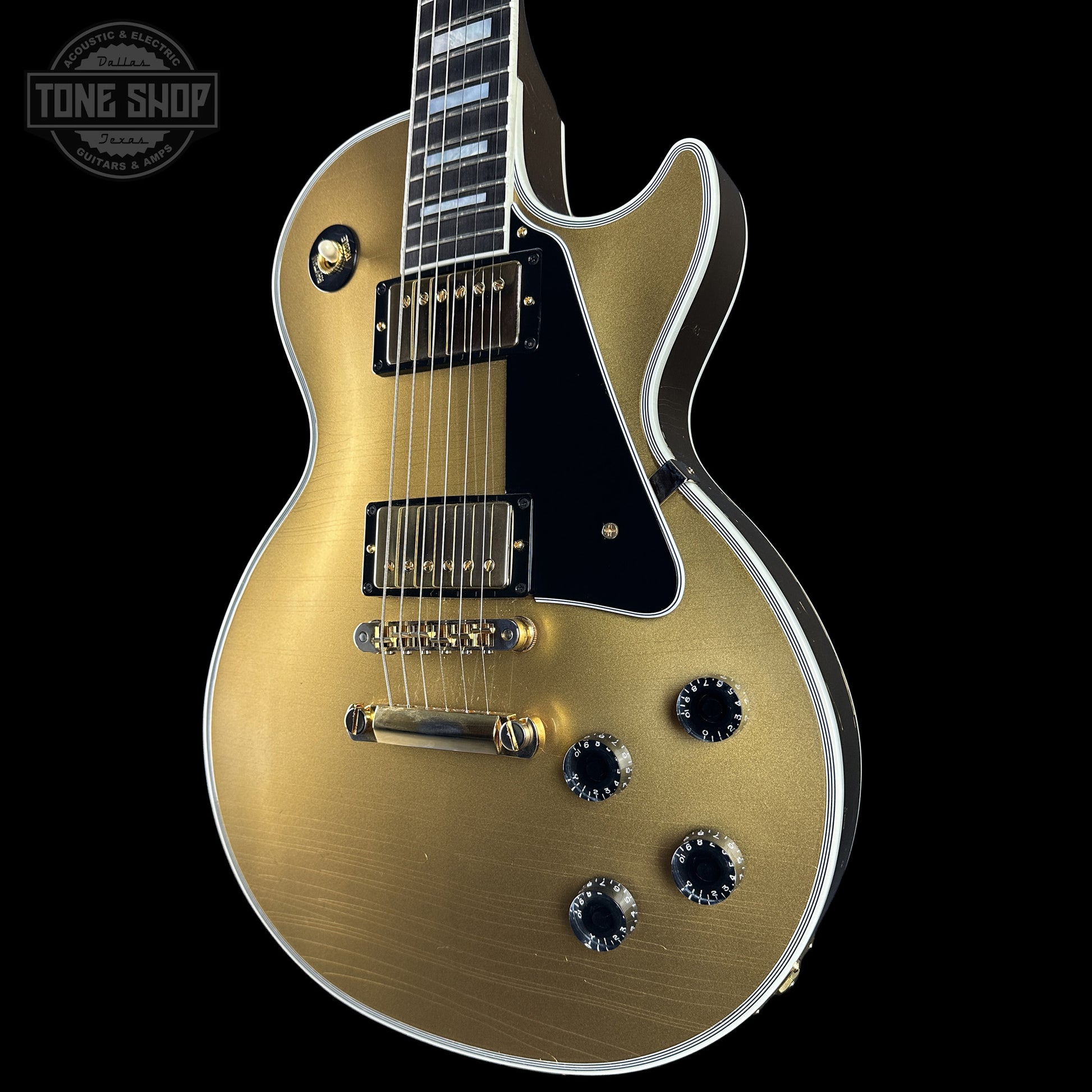 Front right angle of Gibson Custom Dealer Select Les Paul Custom Chambered Double Gold Ultra Light Aged.