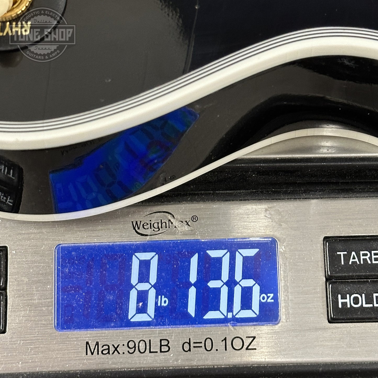 Weight of Gibson Custom Dealer Select Les Paul Custom Ebony Ultra Light Aged CS502595.