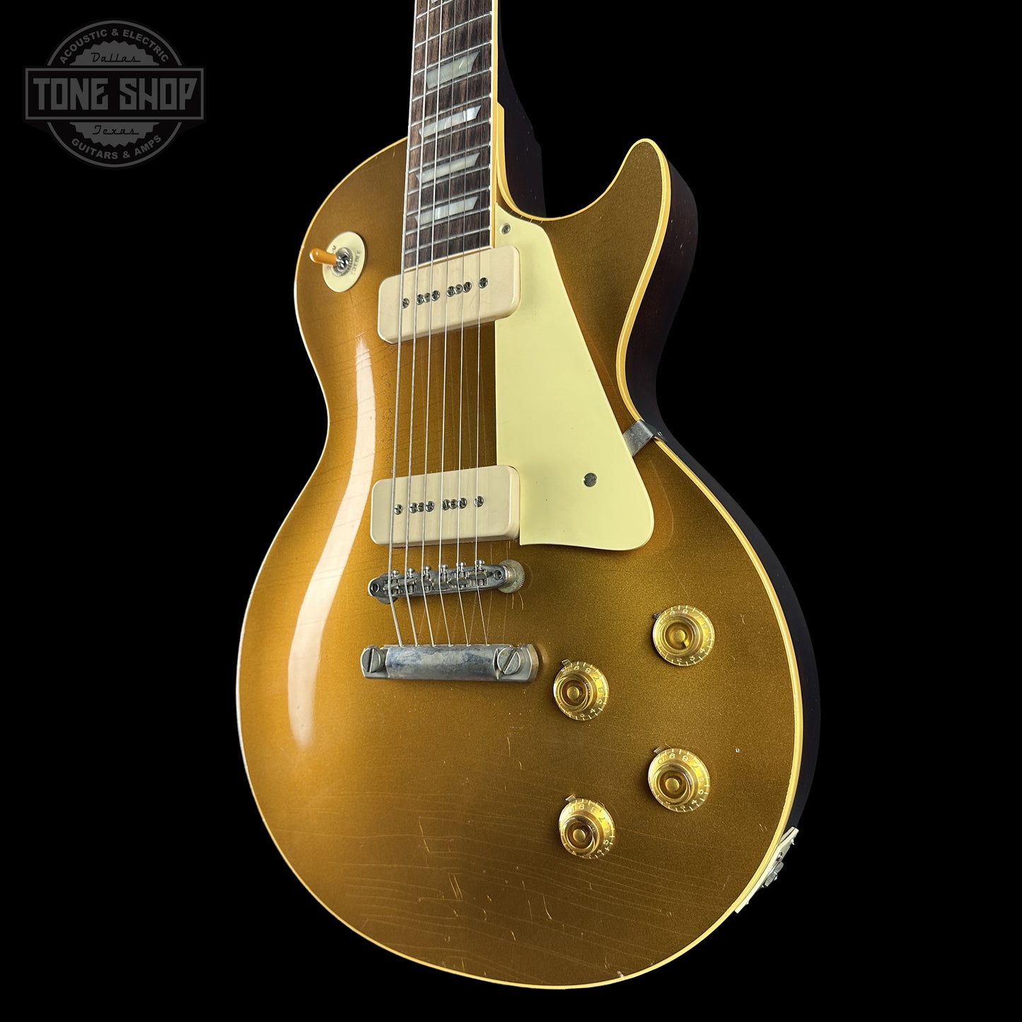 Front right angle of Gibson Custom Dealer Select 1956 Les Paul Chambered Goldtop Aged 65025 body.
