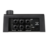 Black audio interface with multiple connectors on a white background