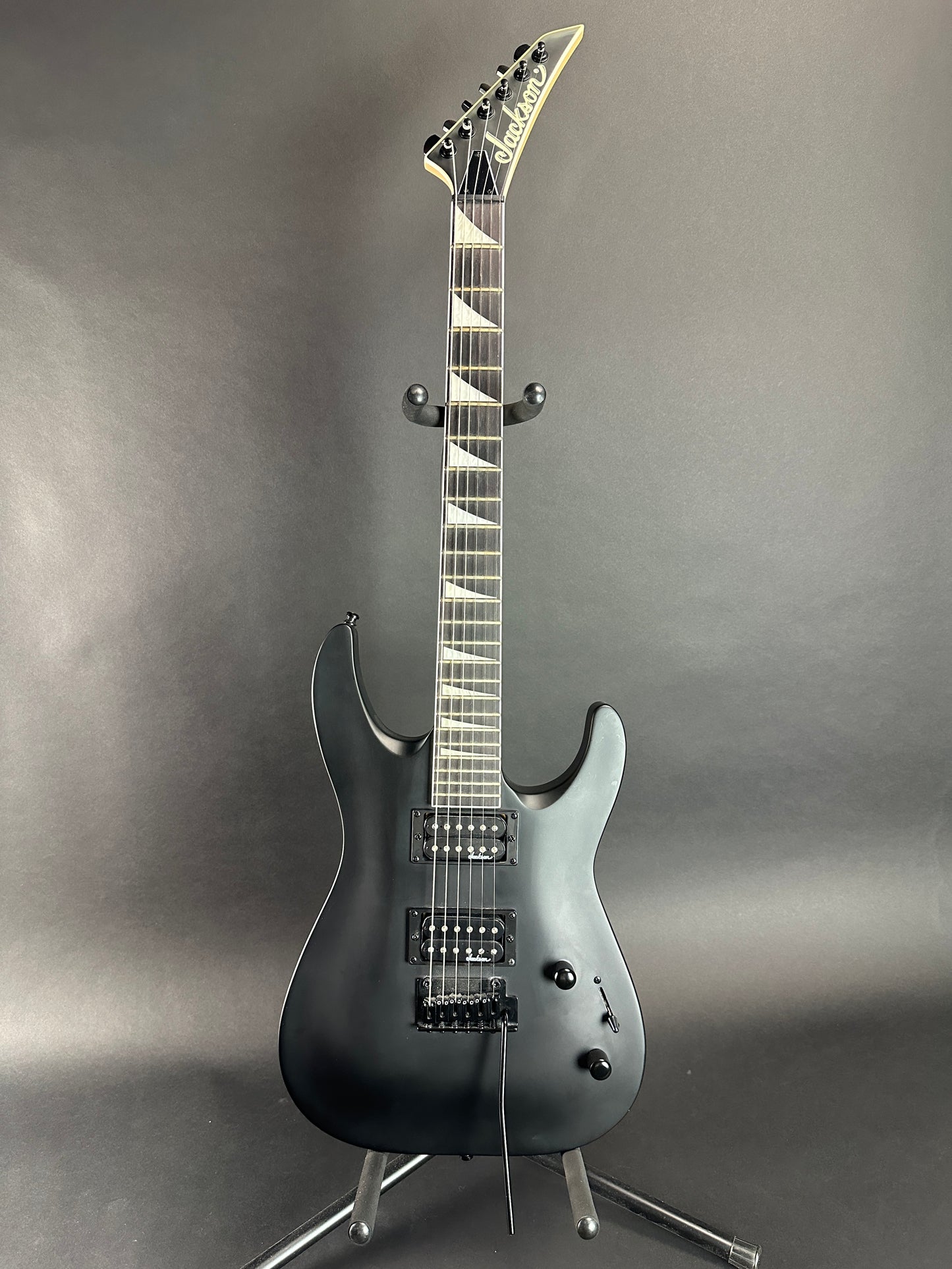 Full front of Used Jackson JS Series Dinky Arch Top Satin Black.
