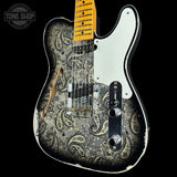 A Fender Telecaster-style electric guitar with a black and white paisley patterned body, a white pickguard, and a yellow maple neck, shown against a black background with a Tone Shop watermark.