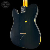 The back of a black Fender Telecaster electric guitar, showing the glossy black body, gold maple neck, and a vintage-style gold Fender logo on a black background.