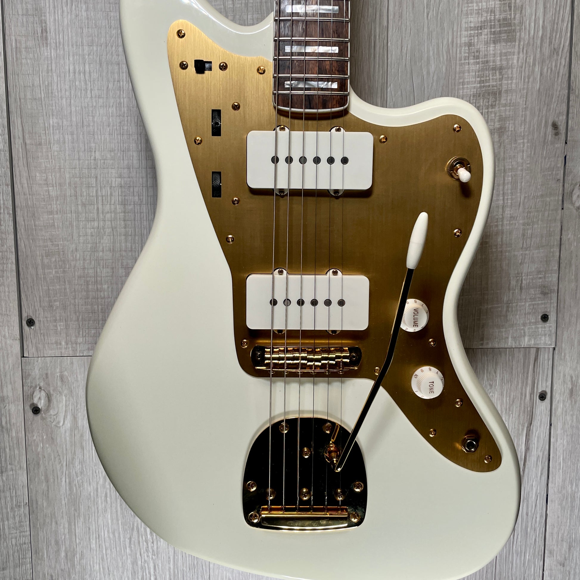 Front view of Used 2022 Squire 40th Anniversary Jazzmaster Gold Edition Olympic White