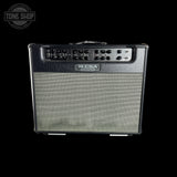 A Mesa studio guitar amplifier with a black cabinet, silver grille, and control panel, shown against a solid black background with a Tone Shop watermark in the top left corner.