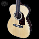 Front angle of Martin Custom Shop  00-14F 28/45 Style Adirondack/Wild Grain East Indian Rosewood.