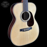 Front angle of Martin Custom Shop  00-14F 28/45 Style Adirondack/Wild Grain East Indian Rosewood.
