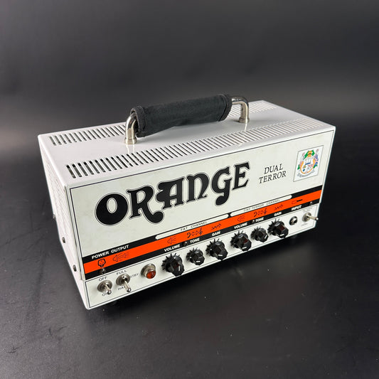 Orange Dual Terror guitar amplifier head on a dark background
