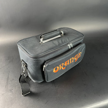 Black carrying case with 'Orange' branding on a gray background