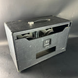 Vintage-style speaker cabinet on a gray background