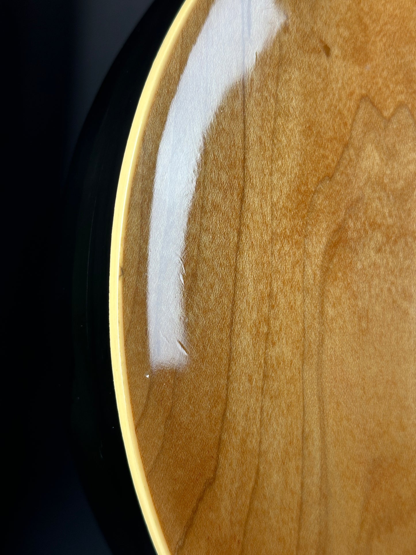 Close-up of a wooden surface with a white mark