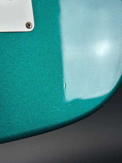 Wear on back of Used Ibanez EX1500 Teal.