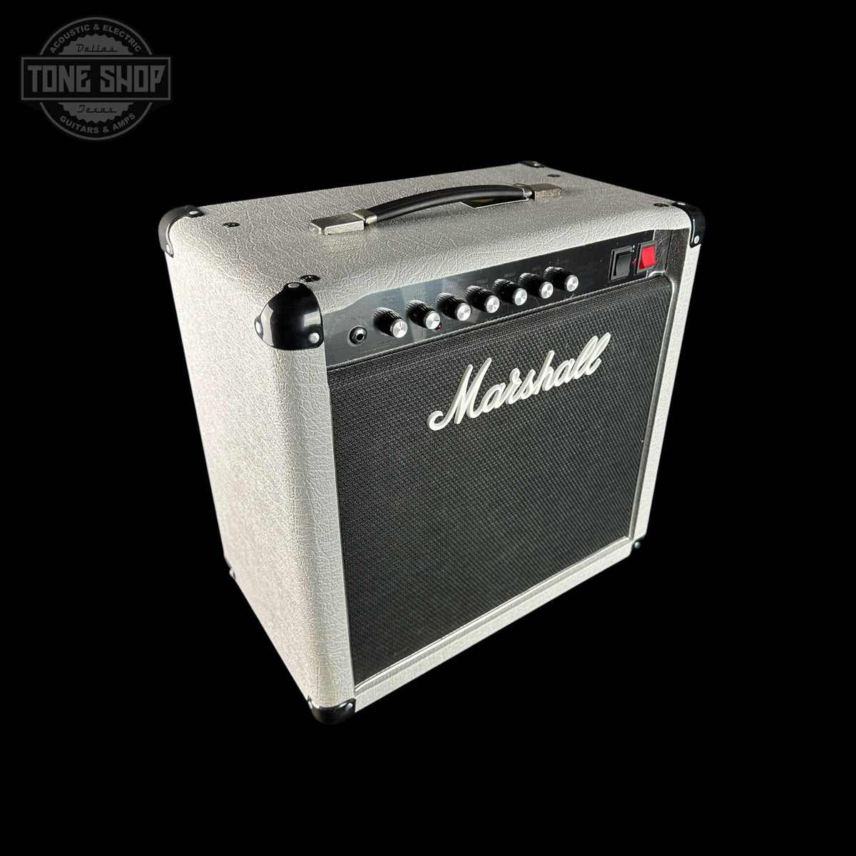A Marshall guitar amplifier with a cream-colored textured cabinet, black front grille, and silver control knobs, shown against a solid black background.