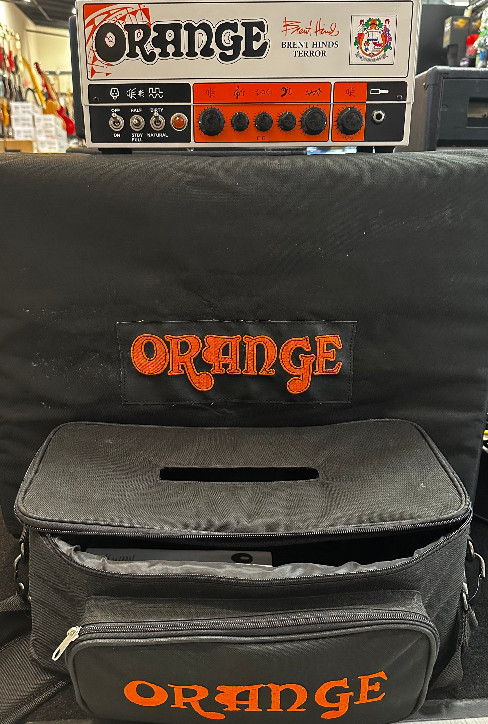 Front view with covers of Used Orange Brent Hinds Terror 2-Channel 15-Watt Guitar Amp Head w/PPC112 Speaker Cab