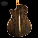 The back of a cutaway acoustic-electric guitar featuring a dark brown wood grain backplate with a light natural wood center stripe, set against a solid black background.