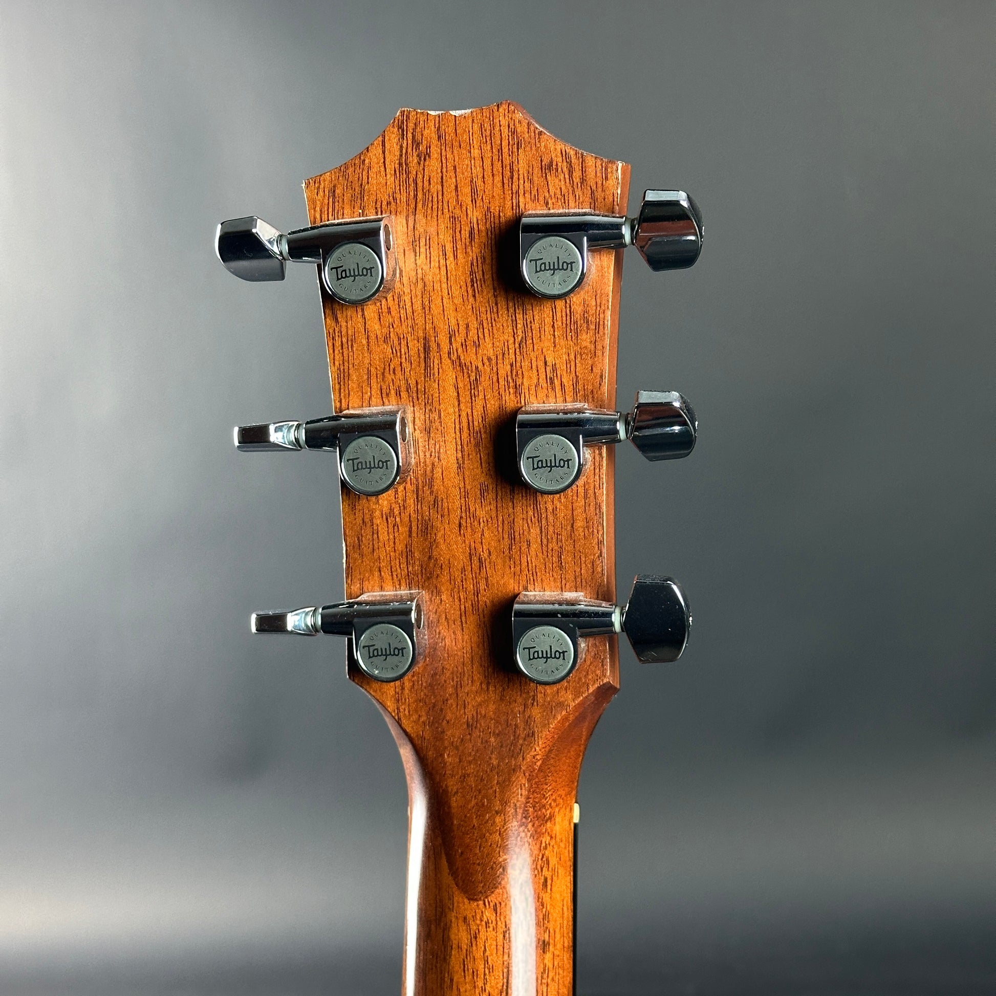 Back of headstock of Used 2010 Taylor 314ce X-Braced.