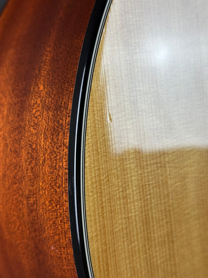 Small ding on body of Used 2010 Taylor 314ce X-Braced.