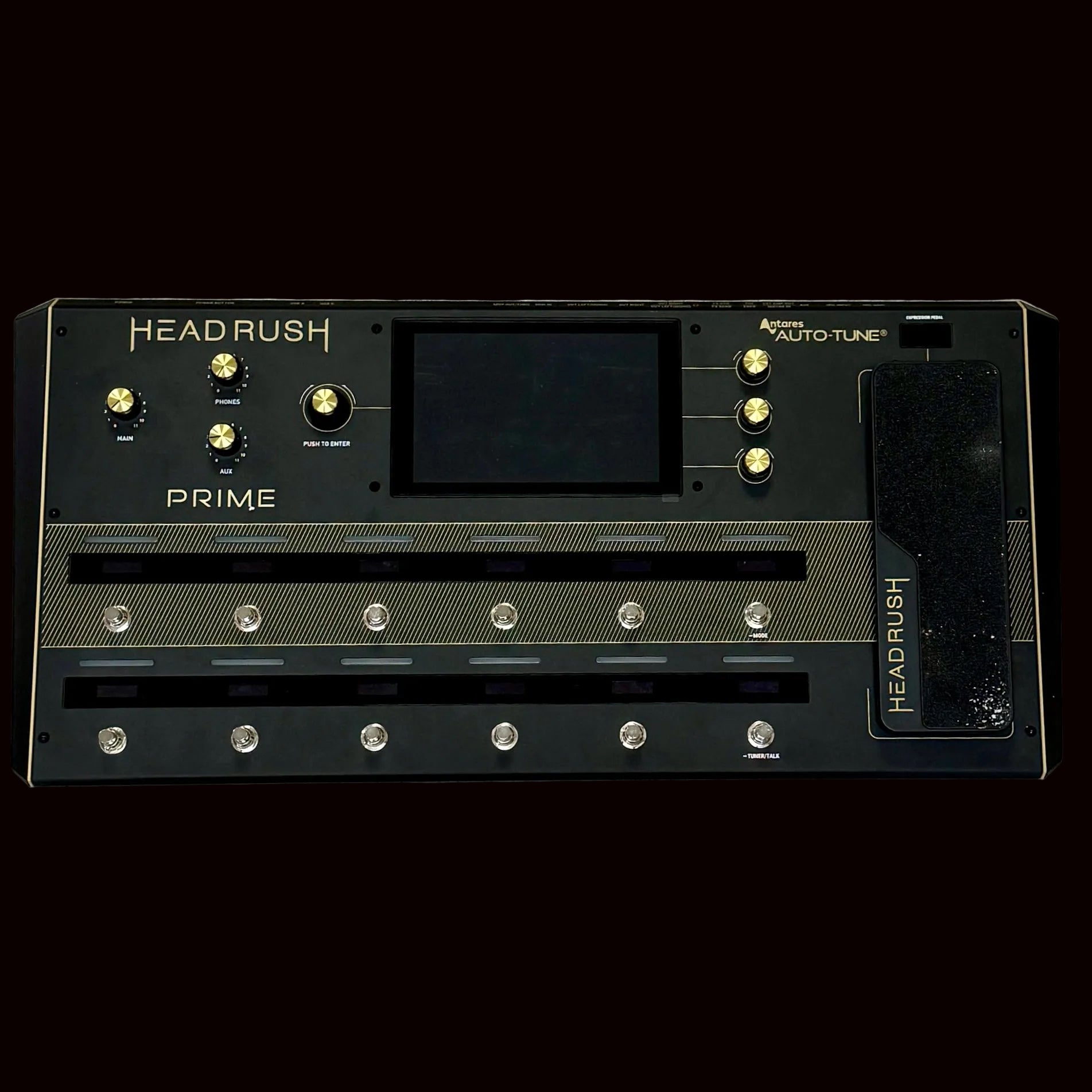 Headrush Prime guitar effects pedal on a wooden surface