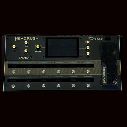 Headrush Prime guitar effects pedal on a wooden surface