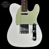 A white Fender Telecaster electric guitar with a light green pickguard and a dark brown maple fretboard, shown against a solid black background. A 'Tone Shop' watermark is visible in the top-left corner.