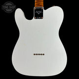 The back of a white Fender Telecaster electric guitar body, featuring a white pickguard, six control screws, and a black Fender logo plate on a black background.