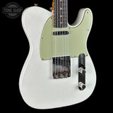 A white electric guitar with a light sage green pickguard, shown against a solid black background. The brand 'Tone Shop' is visible as a watermark in the top-left corner.