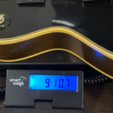 Gibson Custom Limited 68 Les Paul Custom Ebony Top Gold Back Light Aged on scale displaying weight.