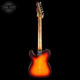 A classic Fender Telecaster-style electric guitar shown from the back, featuring a sunburst finish that transitions from bright orange to dark brown, set against a solid black background.