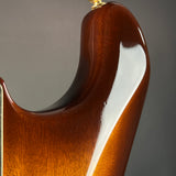 Ding on back of Used 2015 Fender Custom Shop Artisan Okoume Strat.