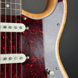 Scratches on pickguard of Used Squier 70's Classic Vibe Stratocaster Natural.