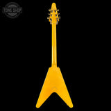 Yellow electric guitar with a black background and 'Tone Shop' logo.