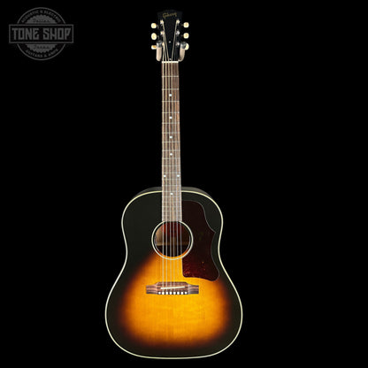 Acoustic guitar with a sunburst finish on a black background, featuring the Gibson logo.