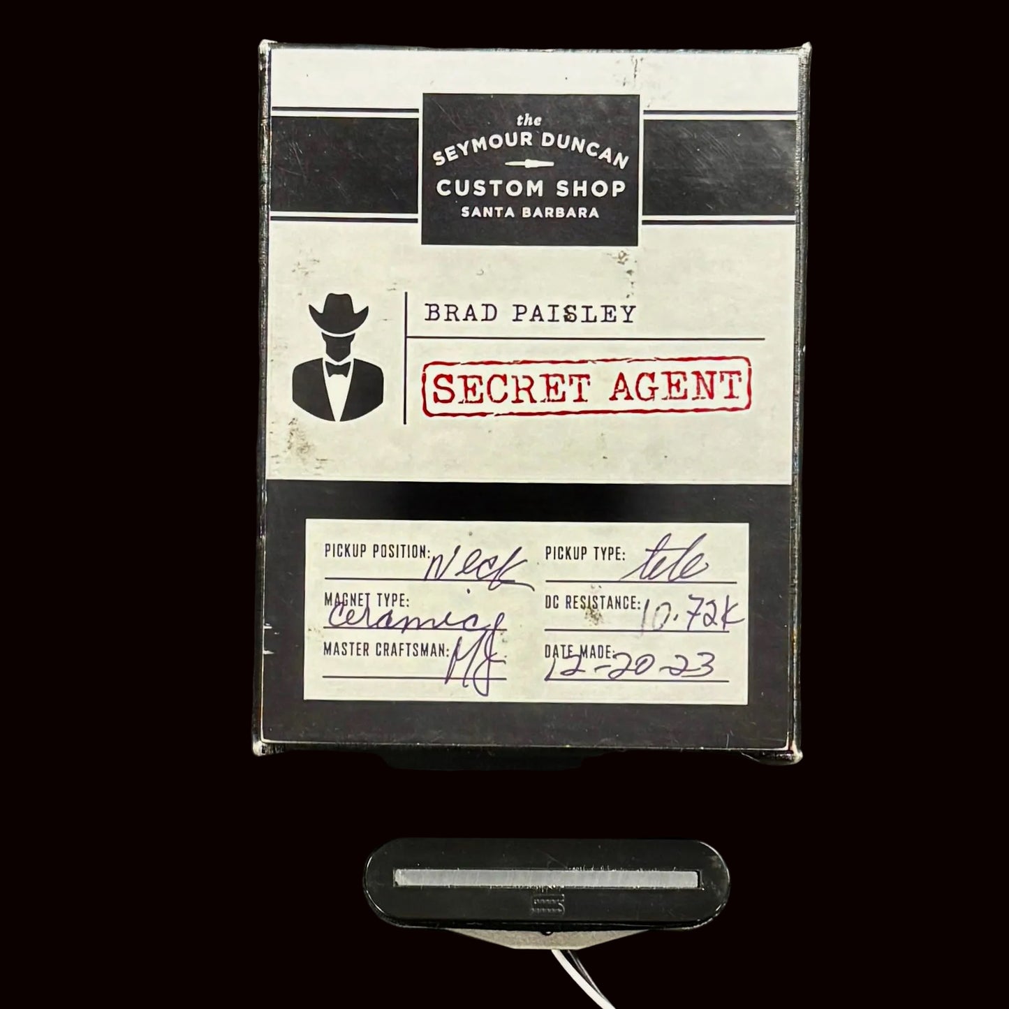 Seymour Duncan guitar pickup packaging with branding and product details on a textured surface